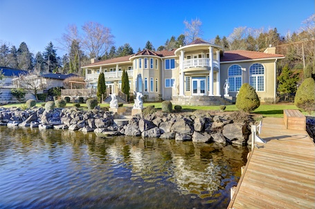 Cleaning modern waterfront homes soft wash techniques for steel and glass in west seattle and tacoma